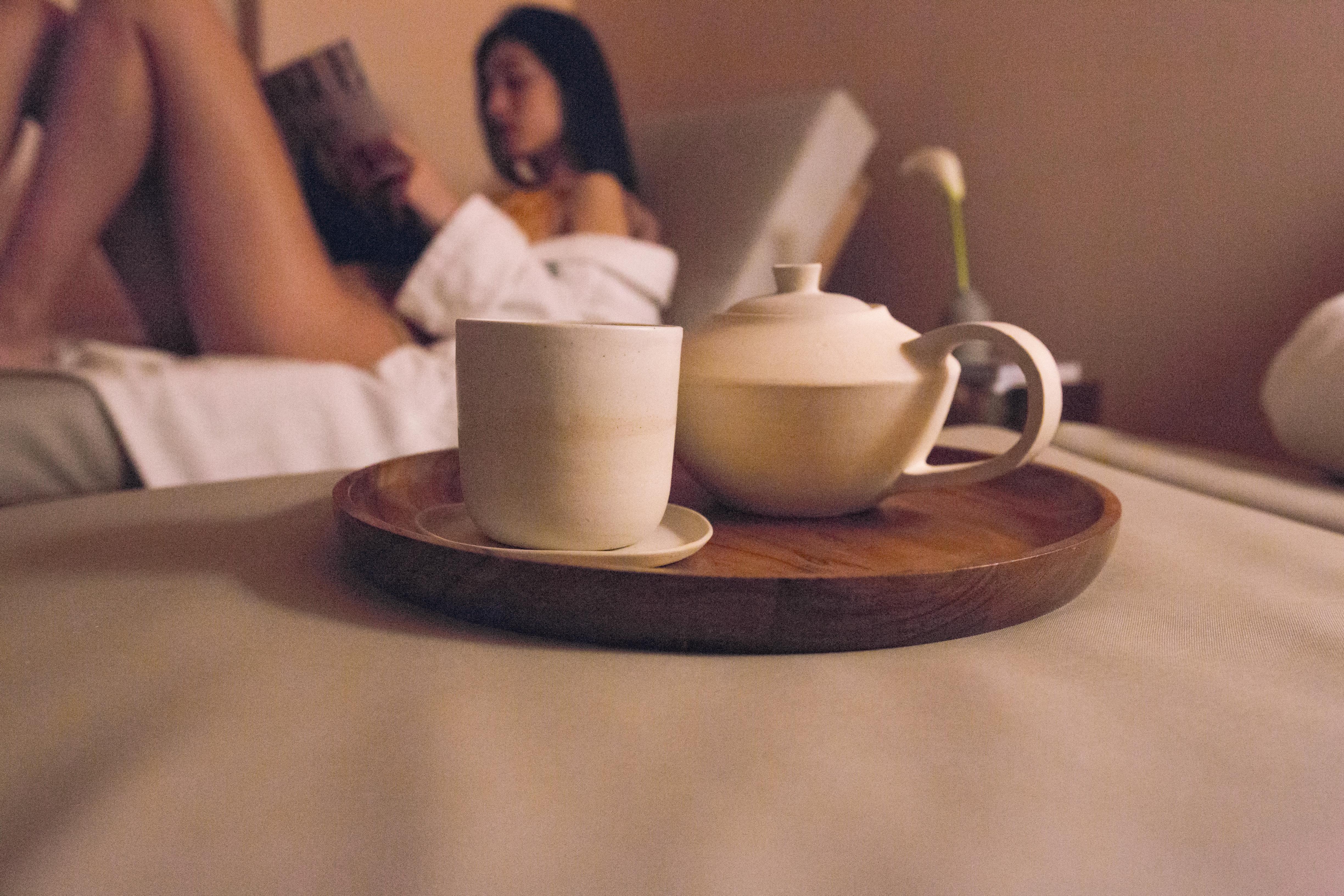 The Vintage Hotel & Spa Lisbon Exterior photo A woman relaxing with a cup of tea